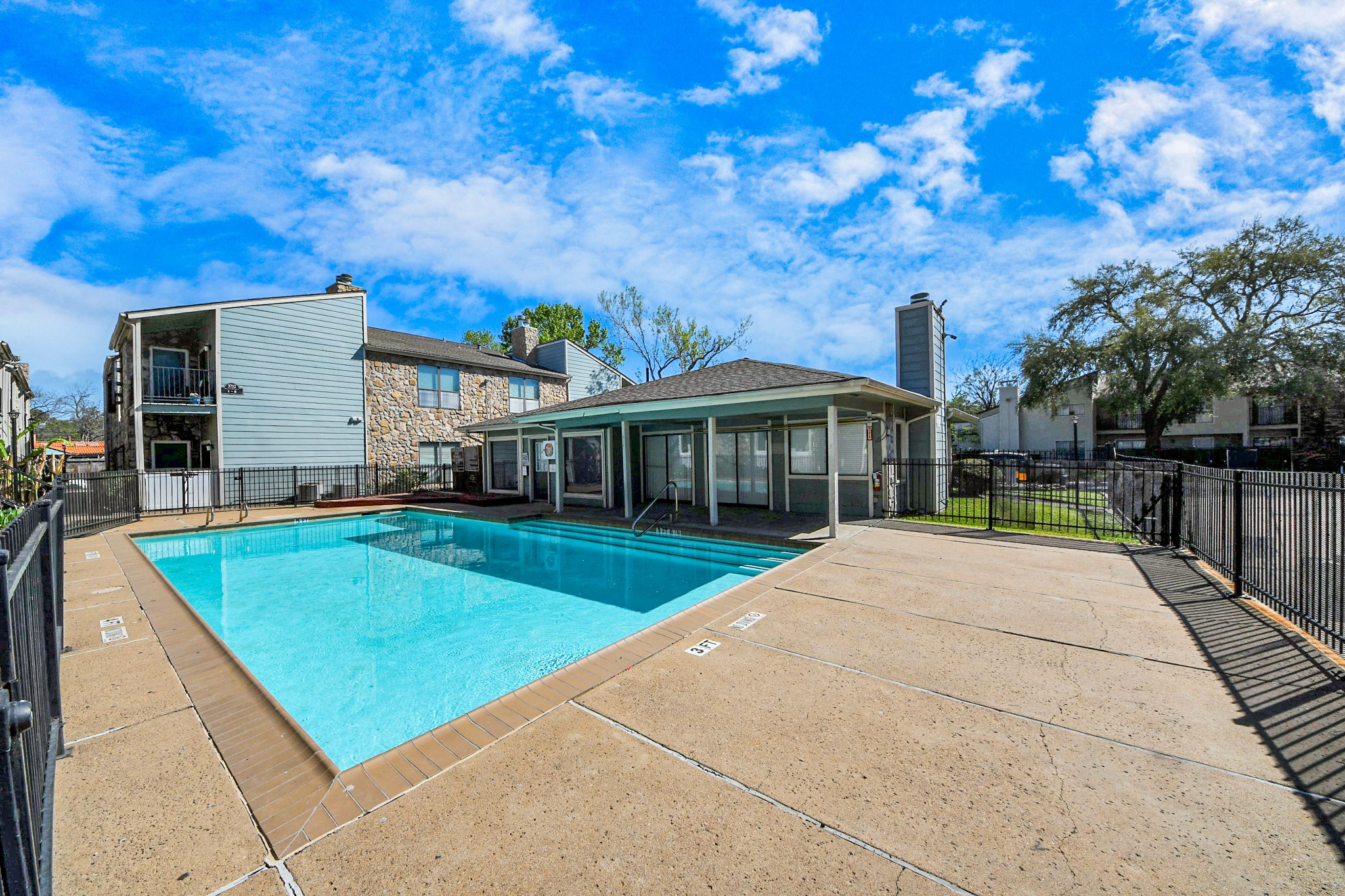 3750 Tanglewilde Street, Unit A7 Houston, TX 77063 - Photo 30 of 36 a view of a house with pool and sitting area