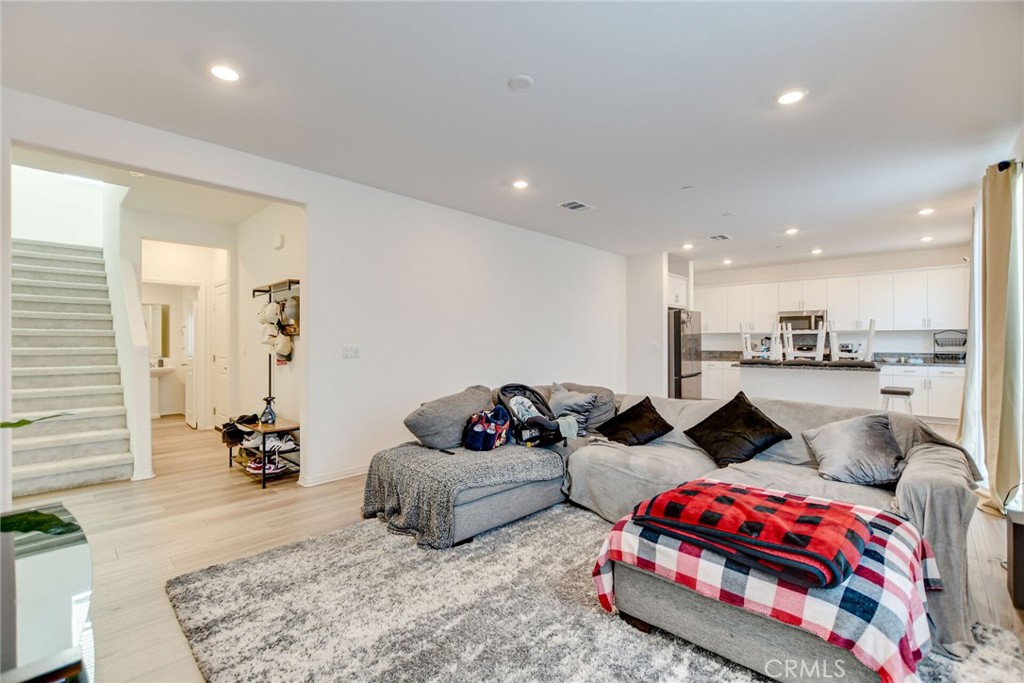 2526 Gunner Ridge Way Rialto, CA 92377 - Photo 13 of 33 a bedroom with two beds and a potted plant