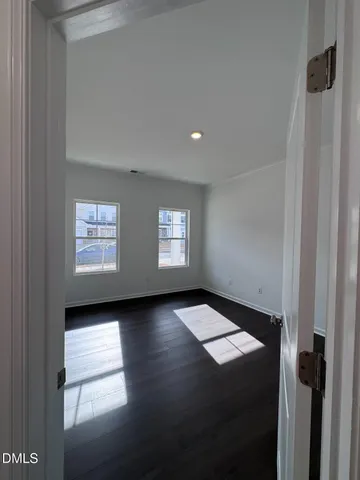 a kitchen with stainless steel appliances granite countertop a sink a stove top oven a counter space and cabinets