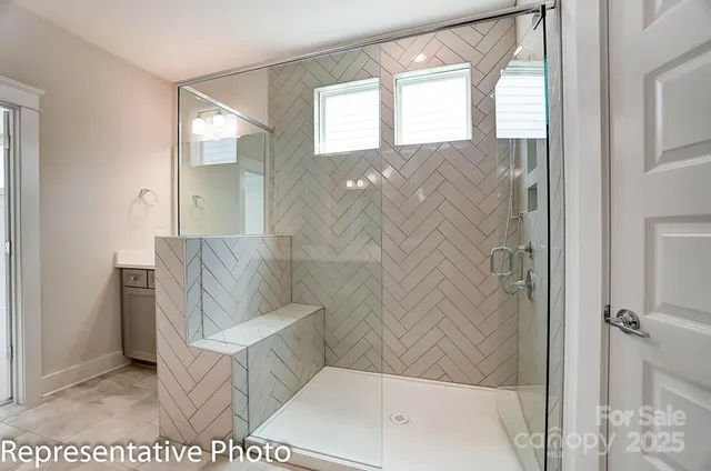 a bathroom with a bathtub and shower