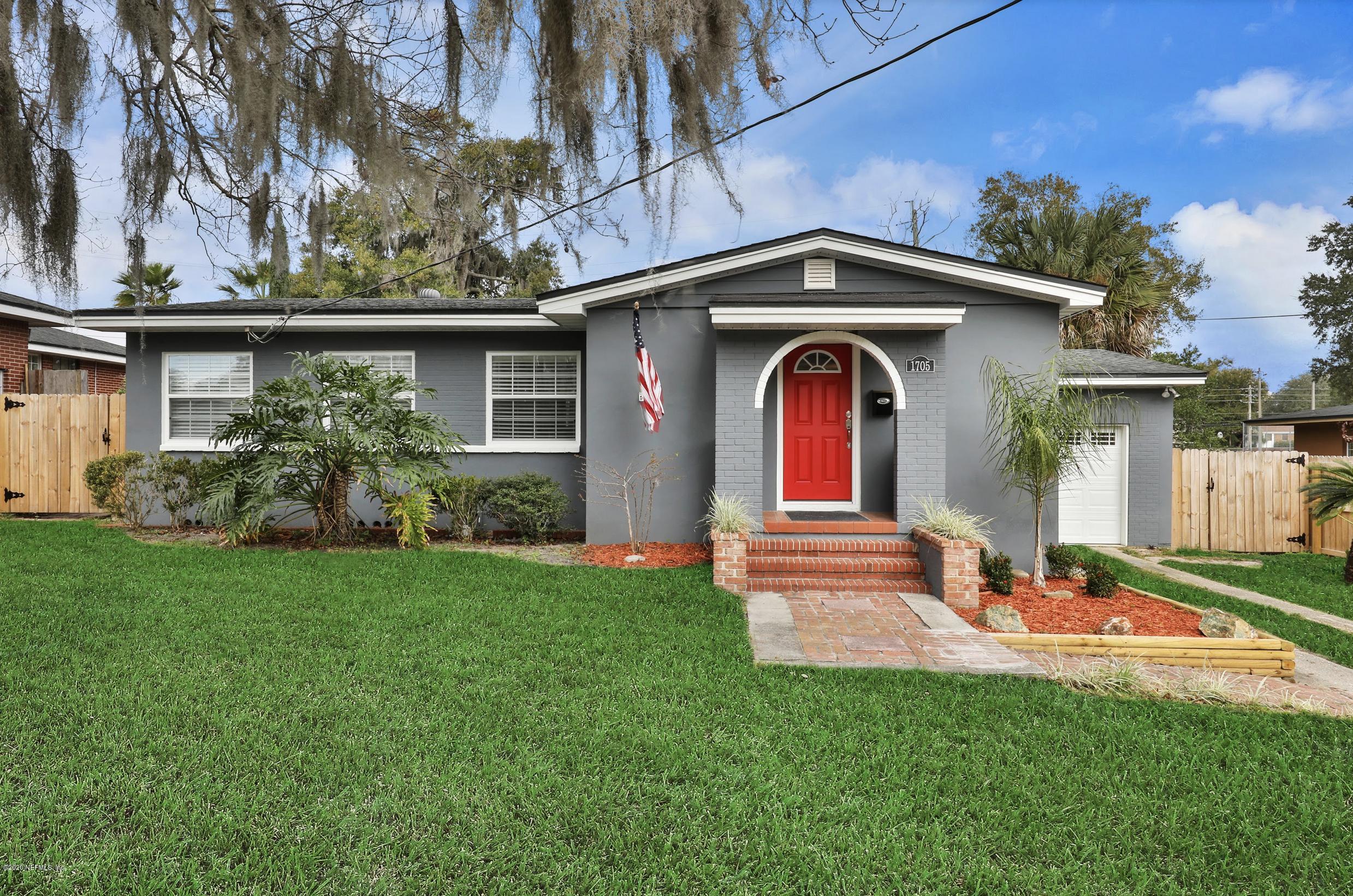 1705 Furman Road Jacksonville, FL 32217 - Photo 1 of 23 a front view of a house with garden