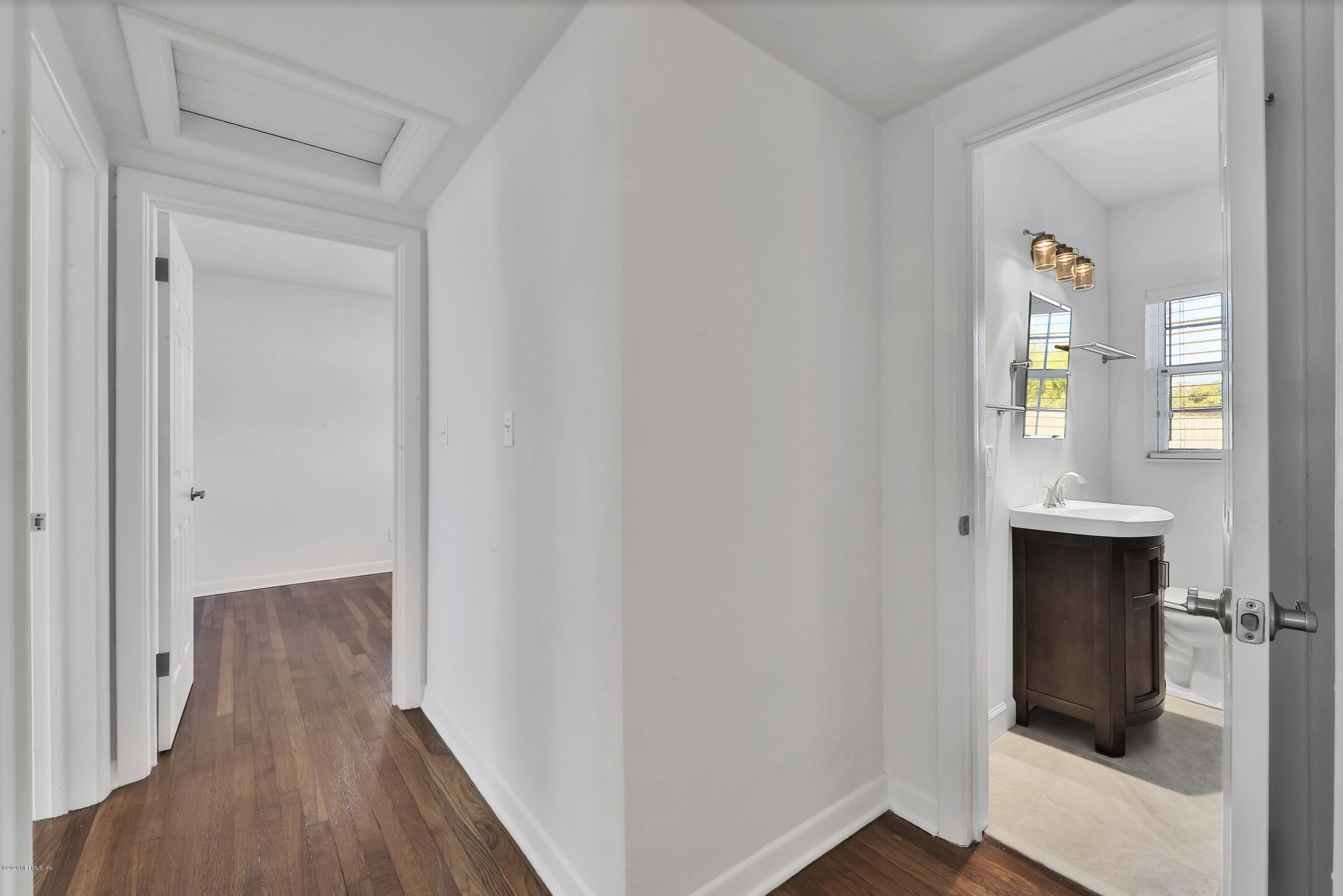 1705 Furman Road Jacksonville, FL 32217 - Photo 11 of 23 a view of hallway with wooden floor