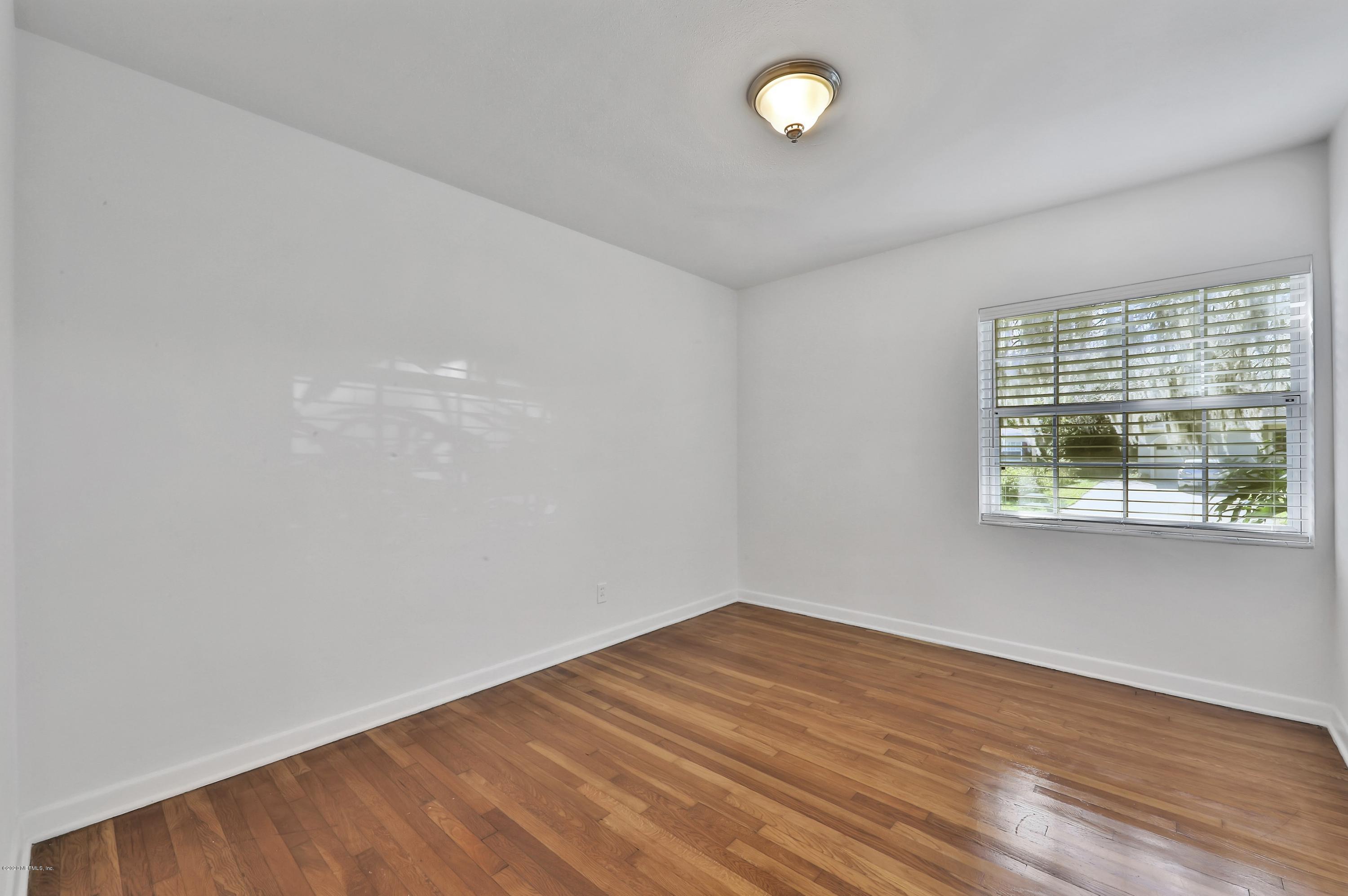 1705 Furman Road Jacksonville, FL 32217 - Photo 15 of 23 wooden floor in an empty room with a window