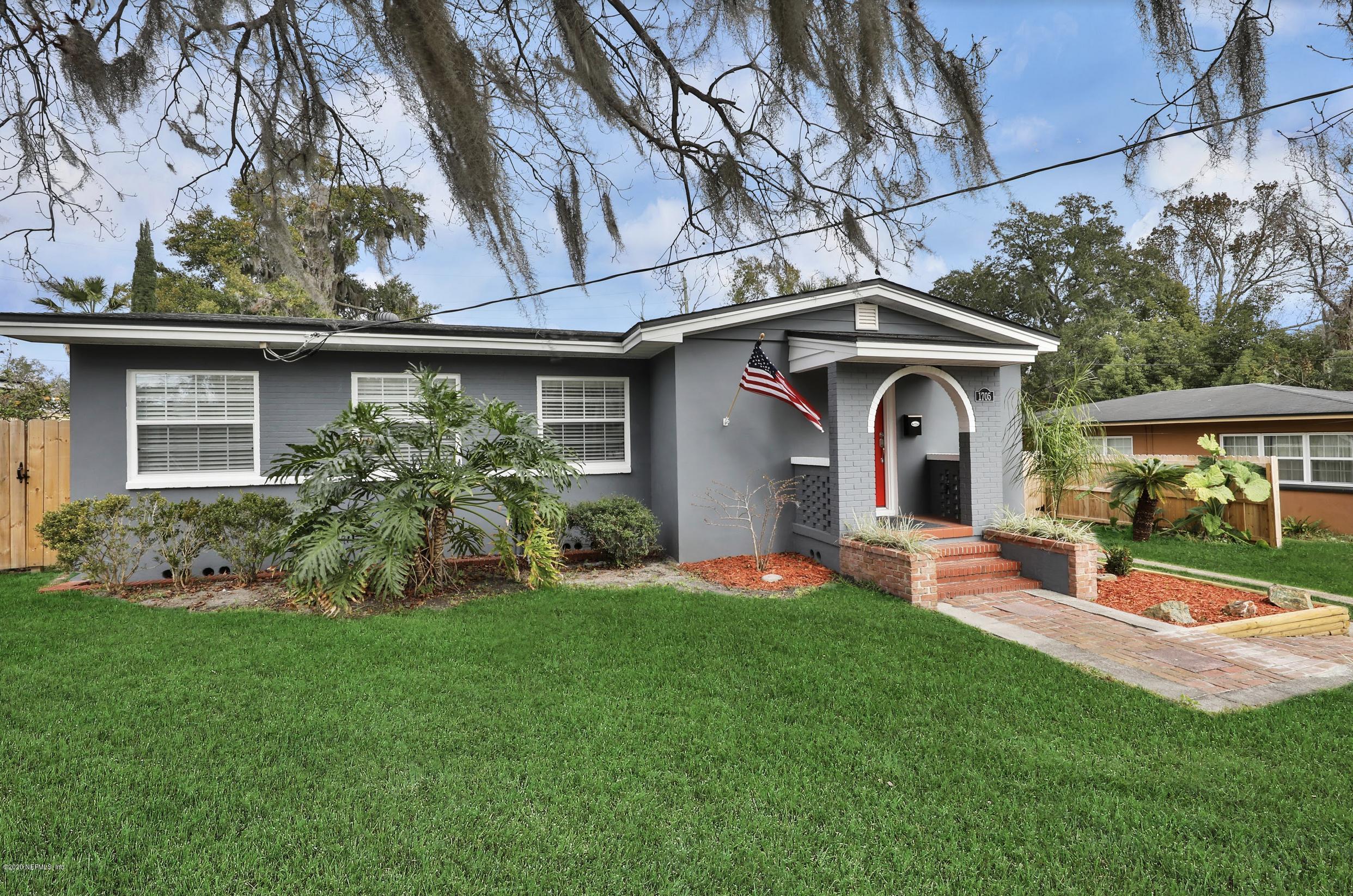 1705 Furman Road Jacksonville, FL 32217 - Photo 3 of 23 a front view of a house with a yard and porch