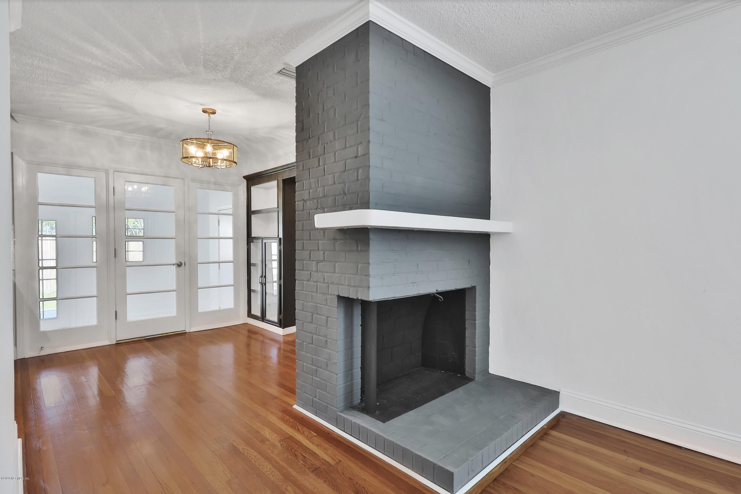 1705 Furman Road Jacksonville, FL 32217 - Photo 5 of 23 a living room with a fireplace