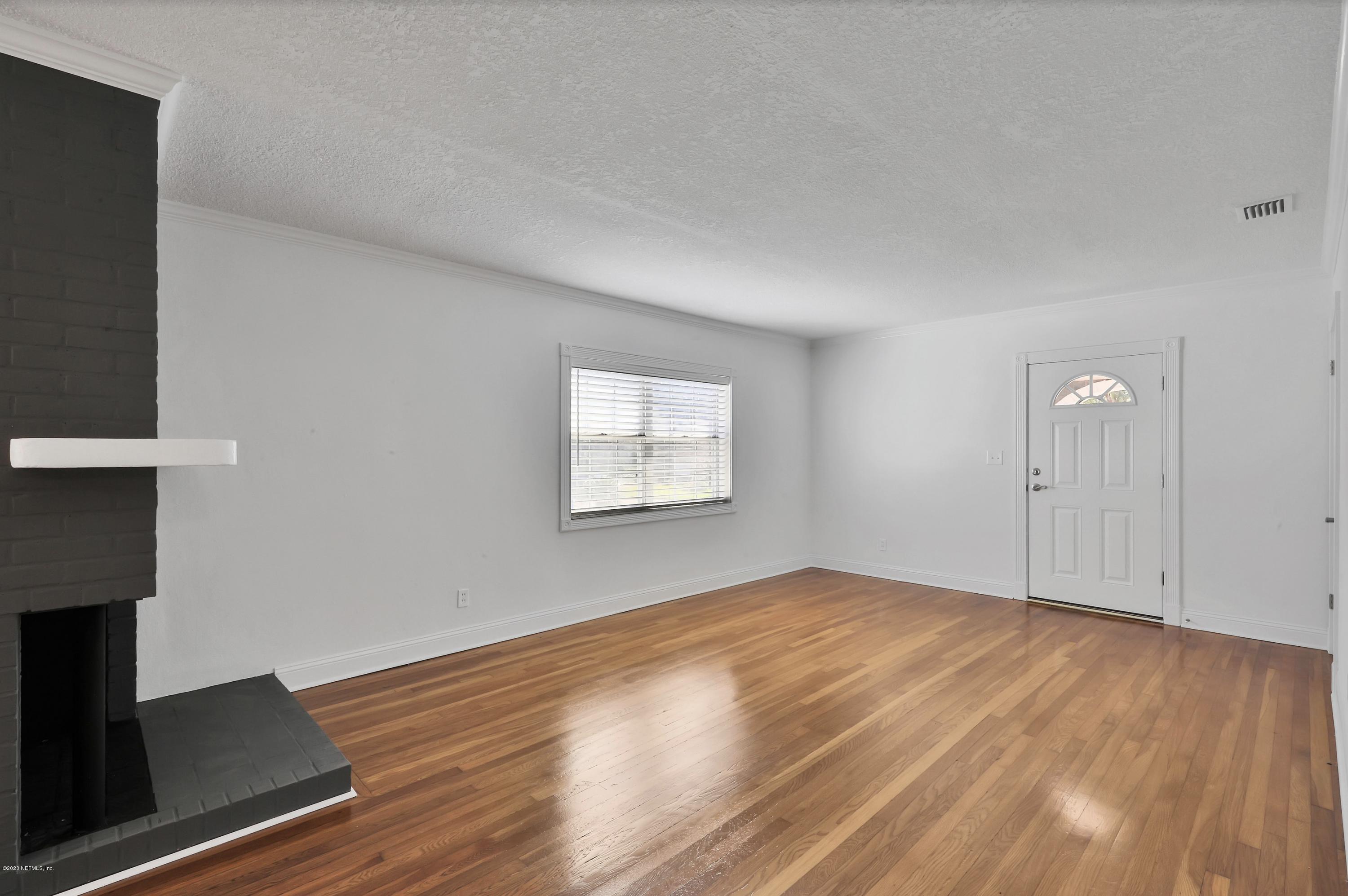 1705 Furman Road Jacksonville, FL 32217 - Photo 6 of 23 wooden floor in an empty room