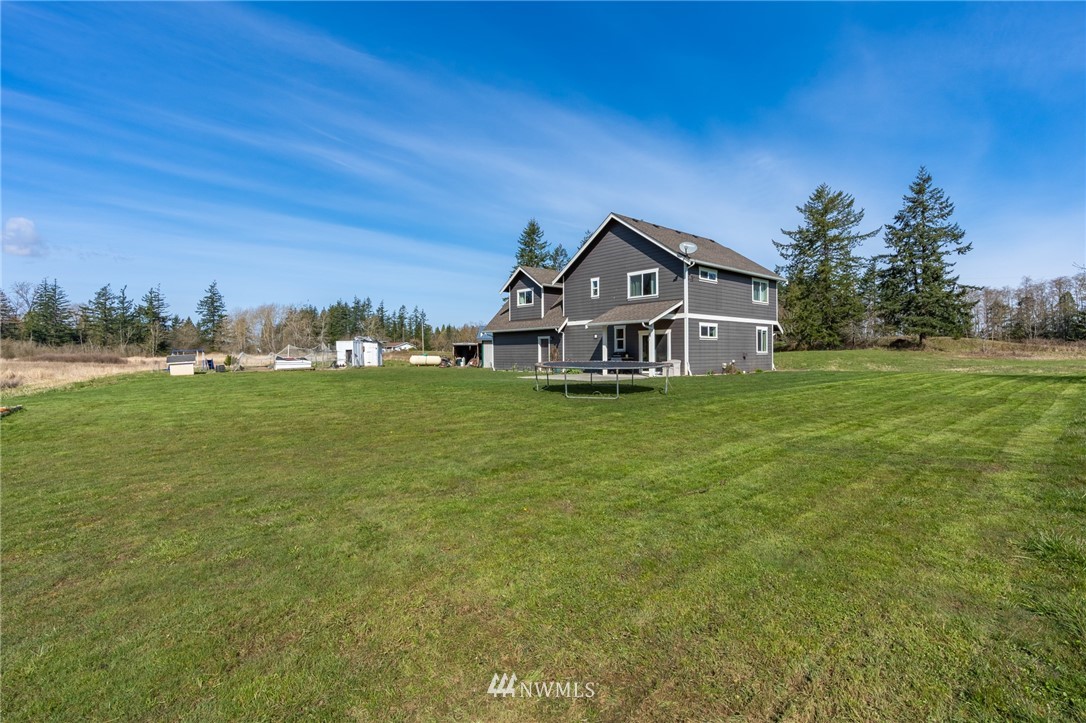 3223 Brown Road Ferndale, WA 98248 - Photo 33 of 40 a front view of a house with a big yard
