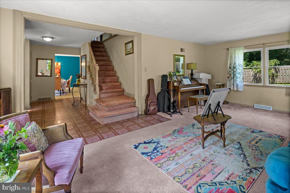 20 Bernard Drive Ewing, NJ 08628 - Photo 7 of 44 a living room with furniture and a wooden floor