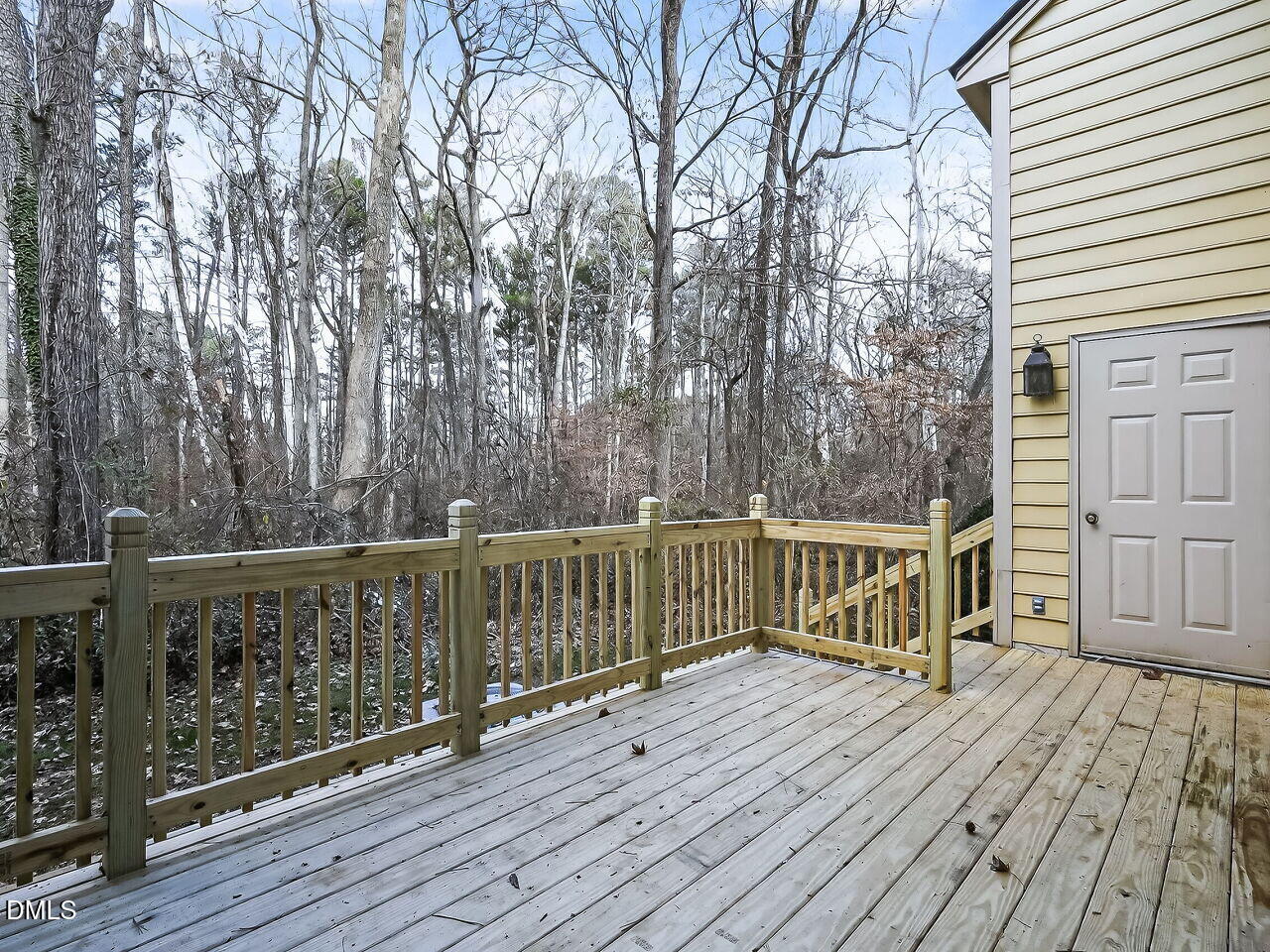 3204 Coachman's Way Durham, NC 27705 - Photo 22 of 27 a view of deck with wooden floor and fence