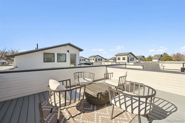 a view of a terrace with furniture