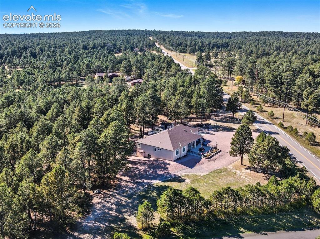 12855 Murphy Road Elbert, CO 80106 - Photo 47 of 50 an aerial view of a houses with a yard