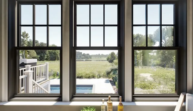 a view of a glass room with a window