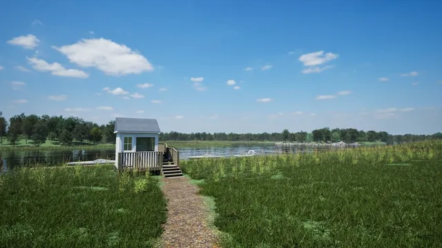a view of a lake with a big yard
