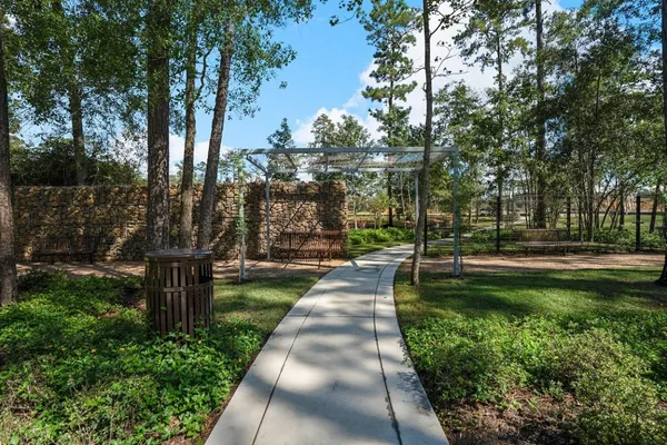 a view of swimming pool with garden