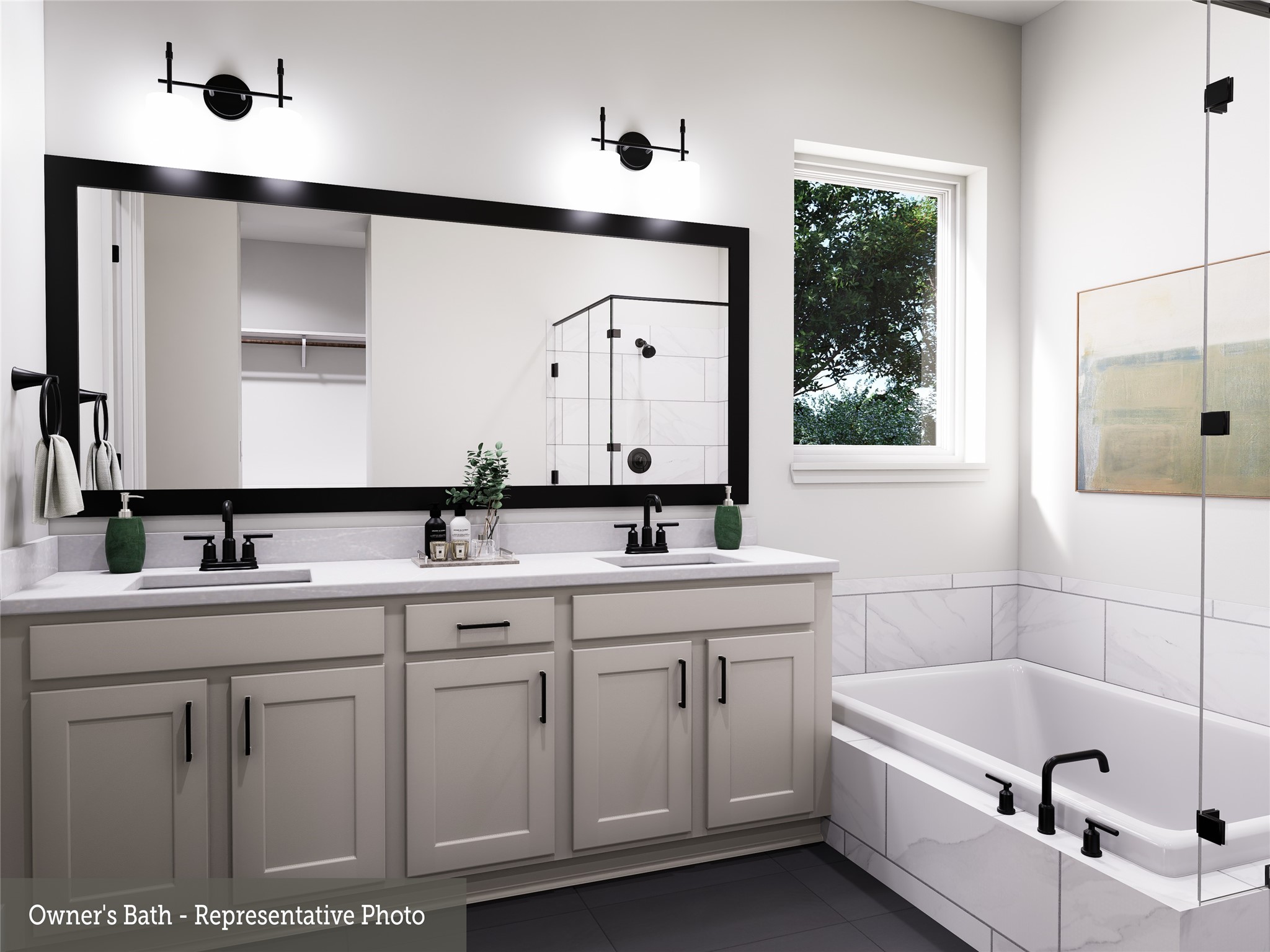 16863 Deep Wingbat Way Magnolia, TX 77354 - Photo 9 of 16 a bathroom with a tub a sink and mirror