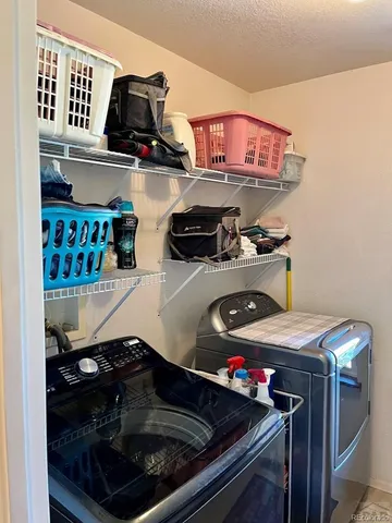 a kitchen with a stove and cabinets