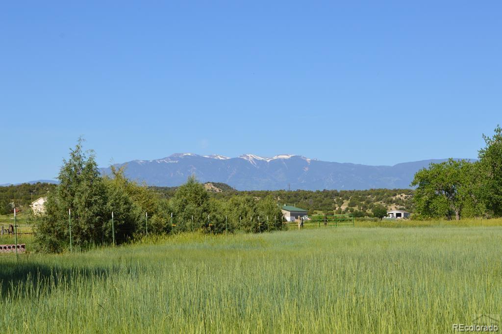 6053 Muddy Creek Road Pueblo, CO 81004 - Photo 42 of 50 a view of lake and mountain