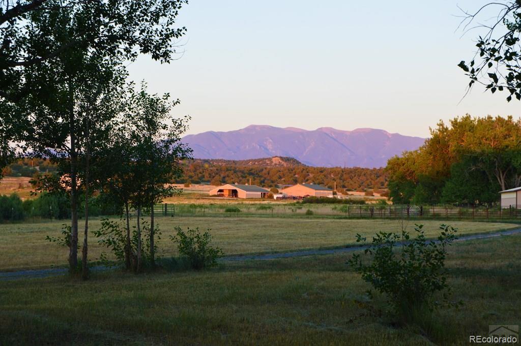 6053 Muddy Creek Road Pueblo, CO 81004 - Photo 43 of 50 a view of grassy field and mountains
