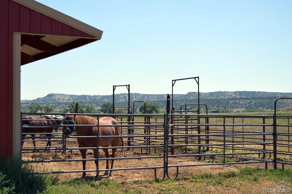 6053 Muddy Creek Road Pueblo, CO 81004 - Photo 46 of 50 a view of a city from a balcony