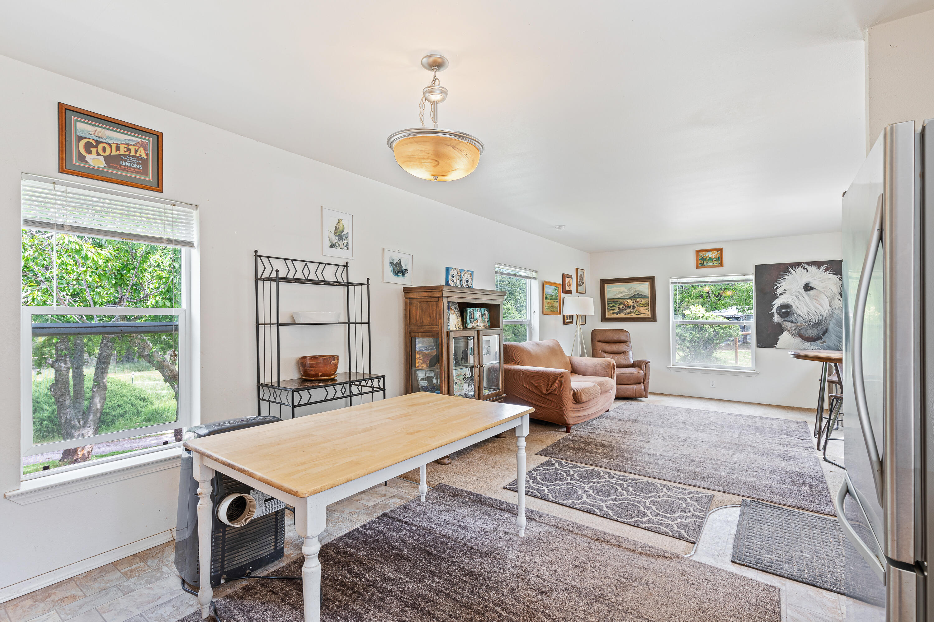 13721 Upper Applegate Road Jacksonville, OR 97530 - Photo 10 of 26 a living room with furniture a window and a table