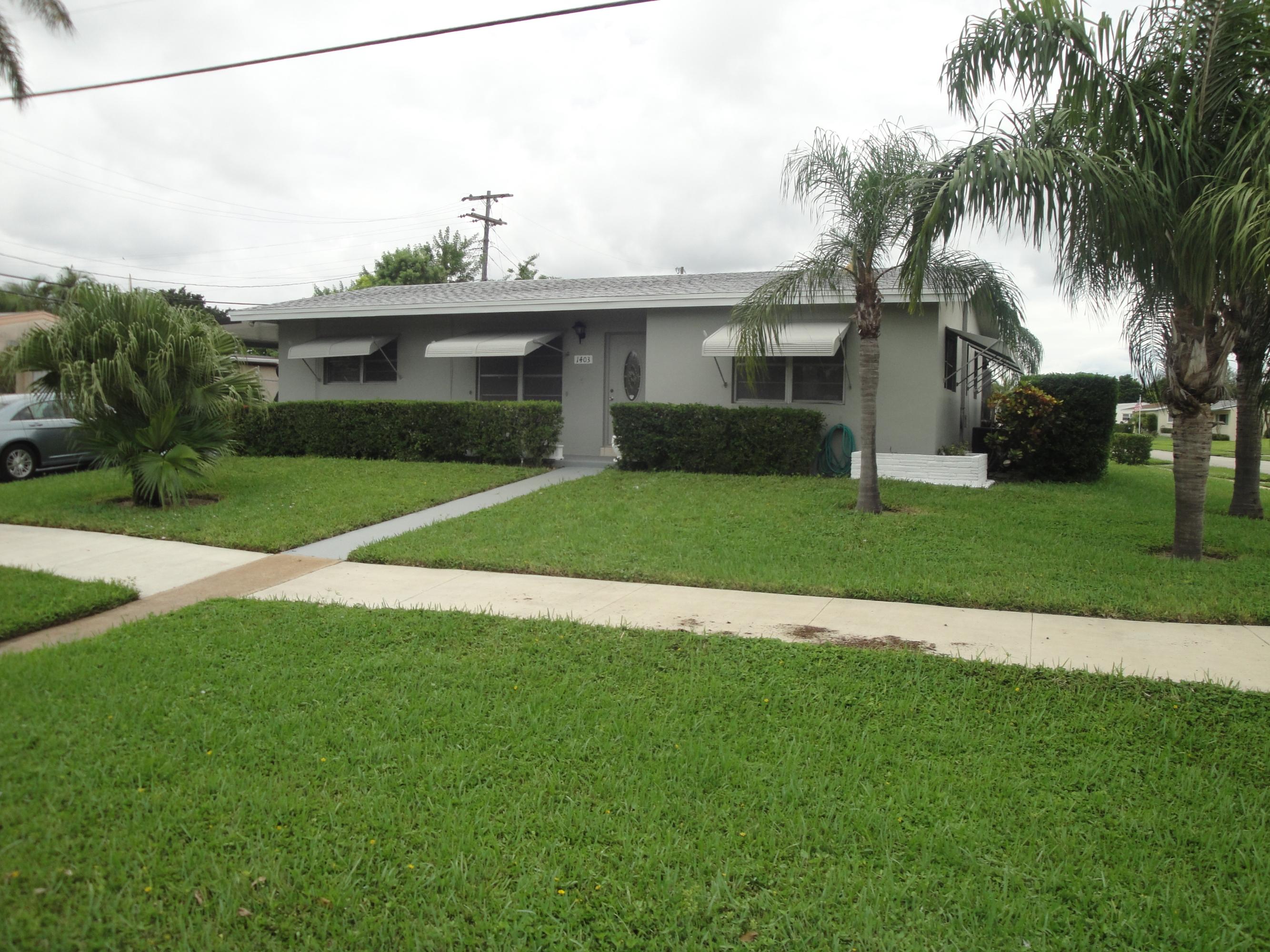 1403 High Ridge Road Lake Worth, FL 33461 - Photo 1 of 9 Front Entry