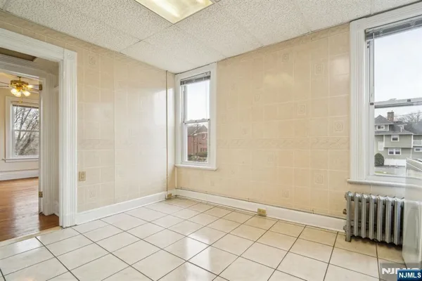 a view of an empty room and window