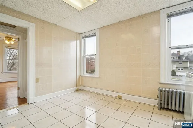 a view of an empty room and window