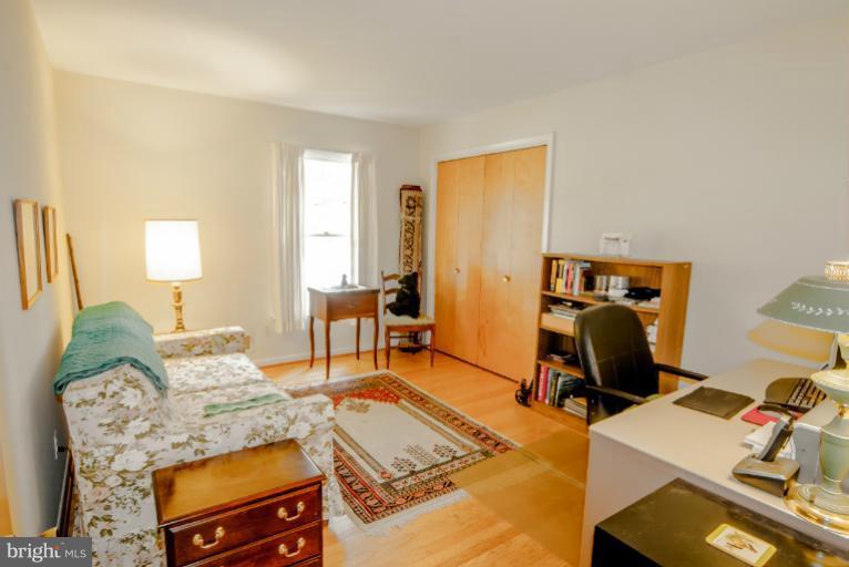 4013 Chatham Road Ellicott City, MD 21042 - Photo 7 of 20 a bedroom with furniture and a wooden floor