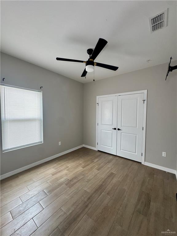 720 Ragland Road, Unit 8 Mission, TX 78572 - Photo 4 of 17 a view of an empty room with a window