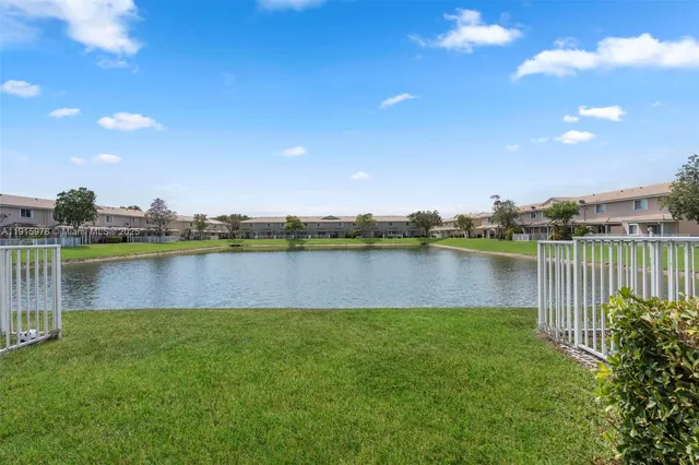 a view of a lake from a yard