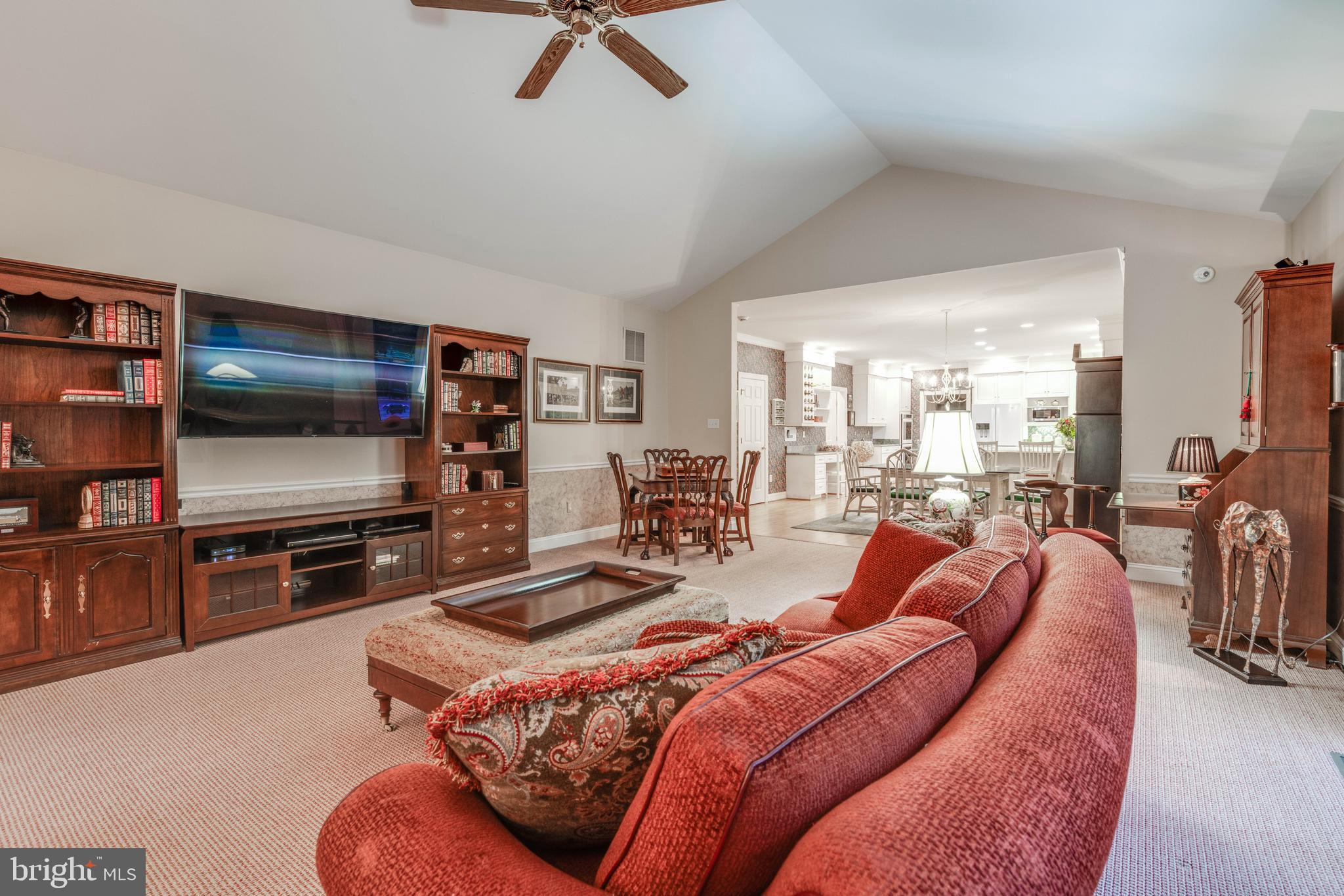 14418 Katie Road Phoenix, MD 21131 - Photo 16 of 29 a living room with furniture and a flat screen tv