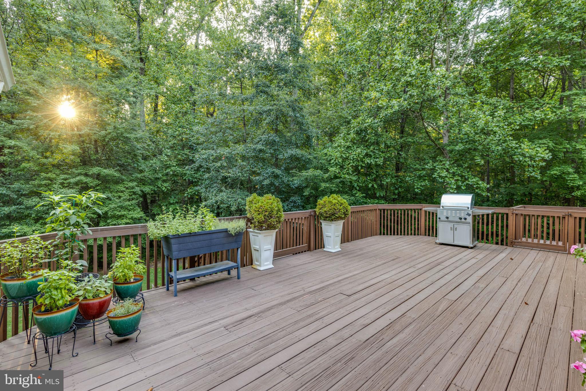 14418 Katie Road Phoenix, MD 21131 - Photo 2 of 29 a view of a roof deck with wooden floor and seating space