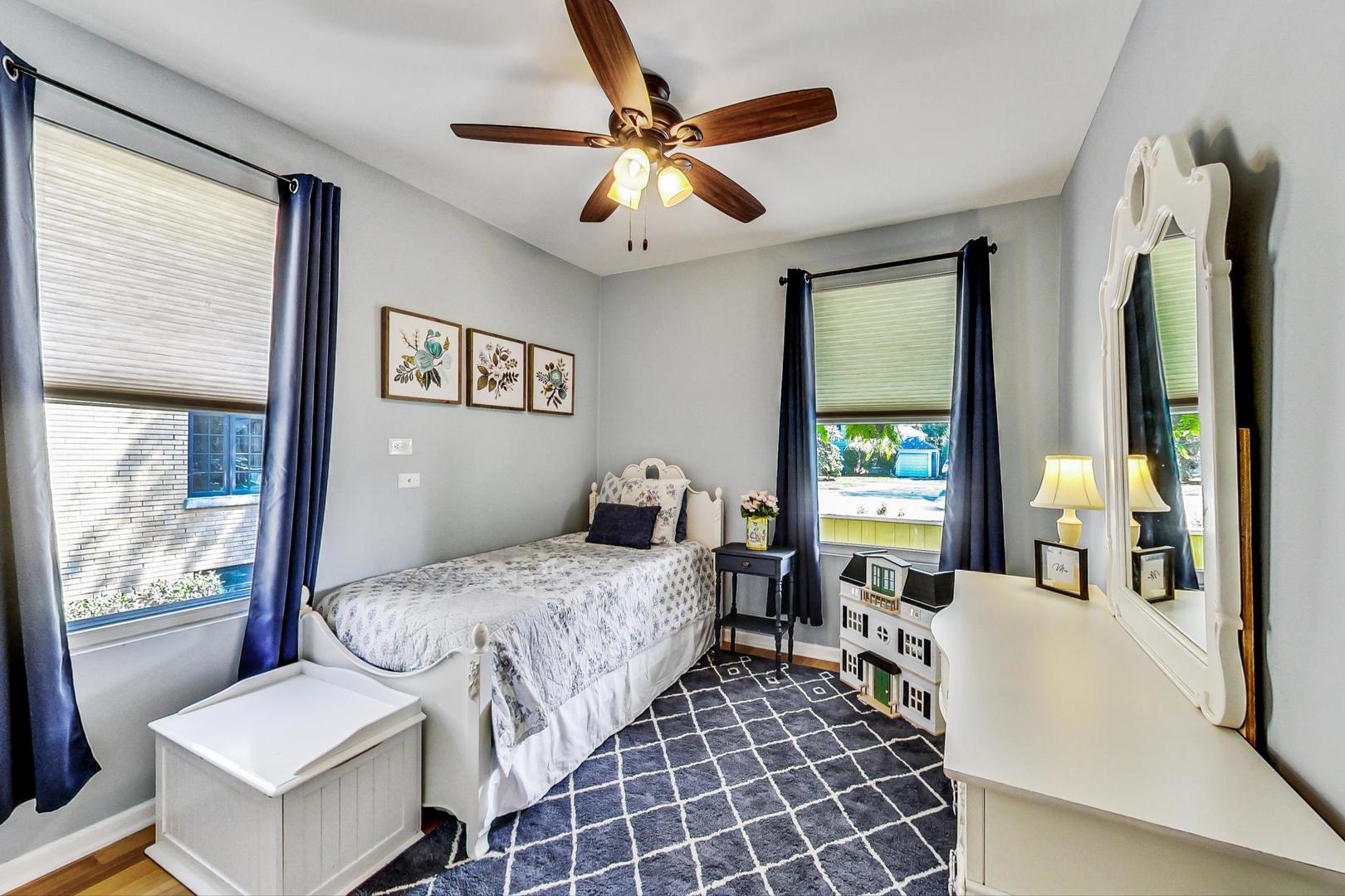 518 South Arlington Heights Road Arlington Heights, IL 60005 - Photo 13 of 42 a bedroom with a bed and window