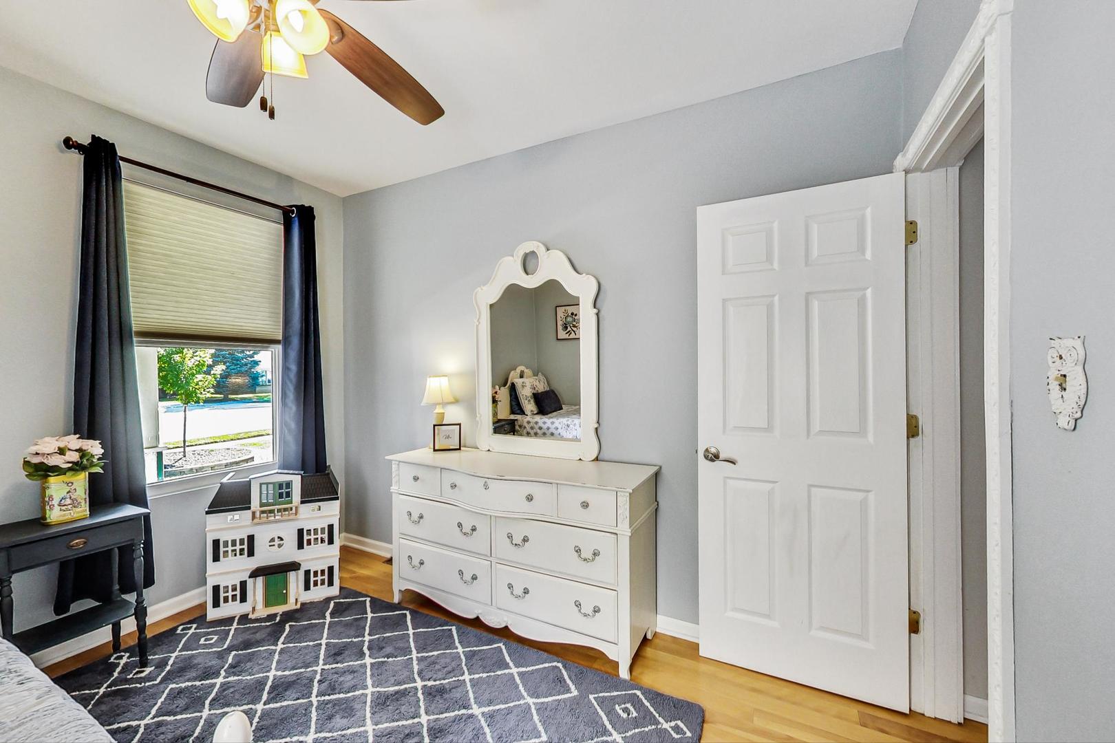 518 South Arlington Heights Road Arlington Heights, IL 60005 - Photo 14 of 42 a view of a workspace with furniture and a window