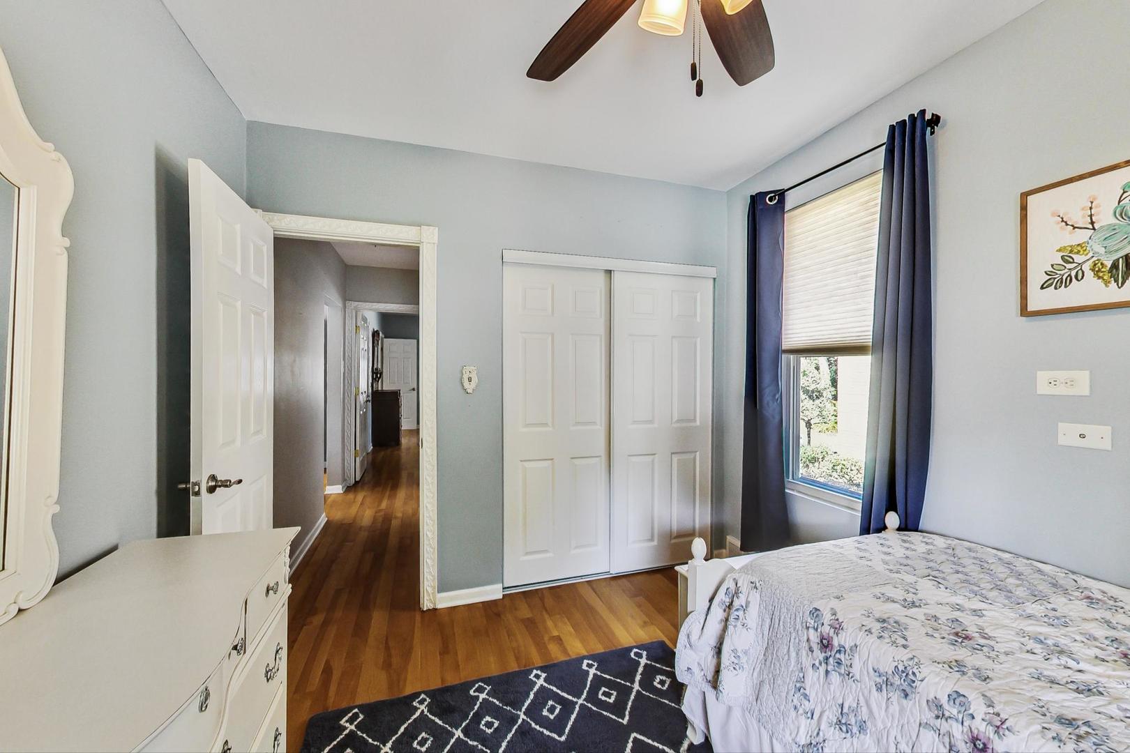 518 South Arlington Heights Road Arlington Heights, IL 60005 - Photo 15 of 42 a bedroom with a bed and a large mirror