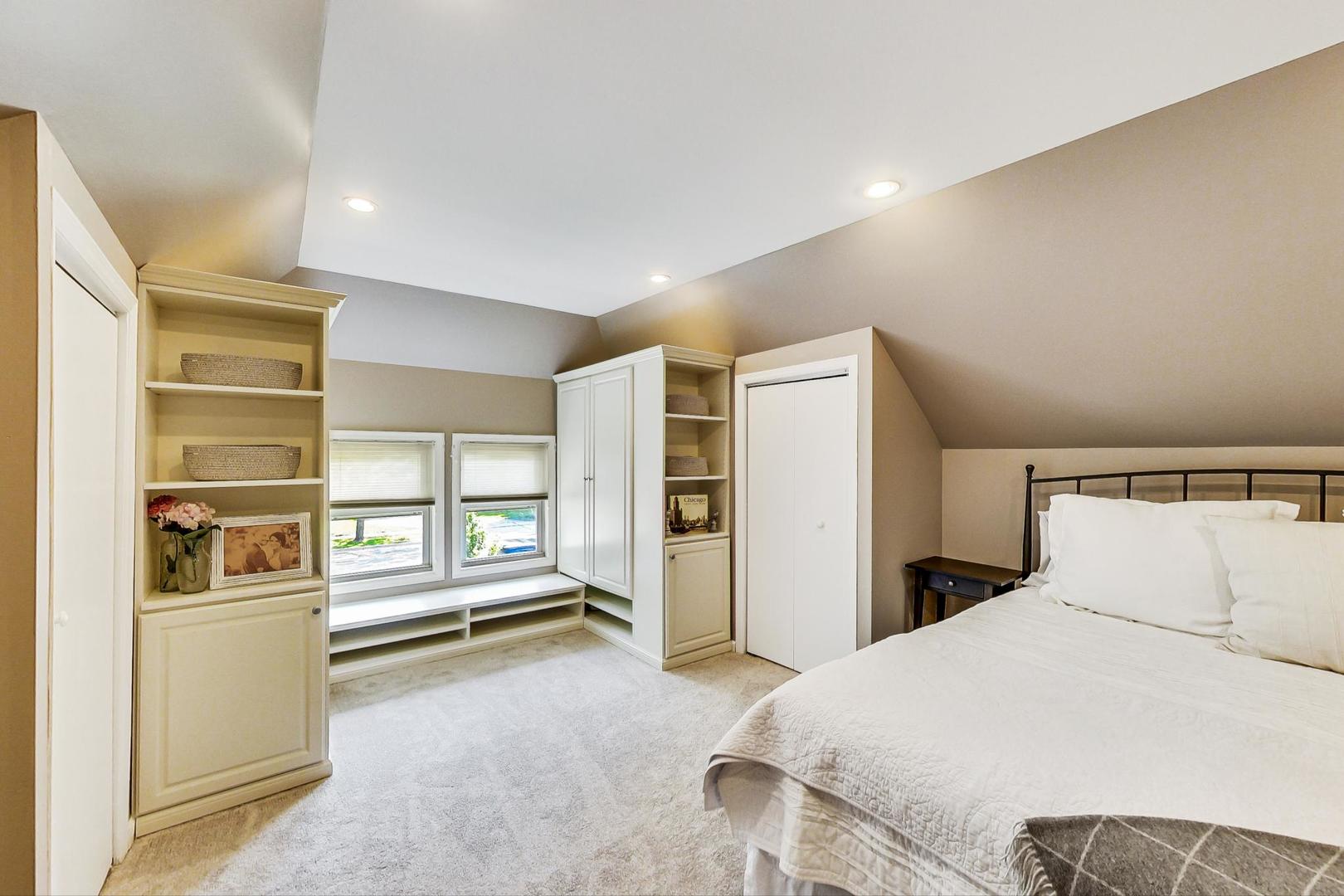518 South Arlington Heights Road Arlington Heights, IL 60005 - Photo 21 of 42 a bedroom with a large bed and a window