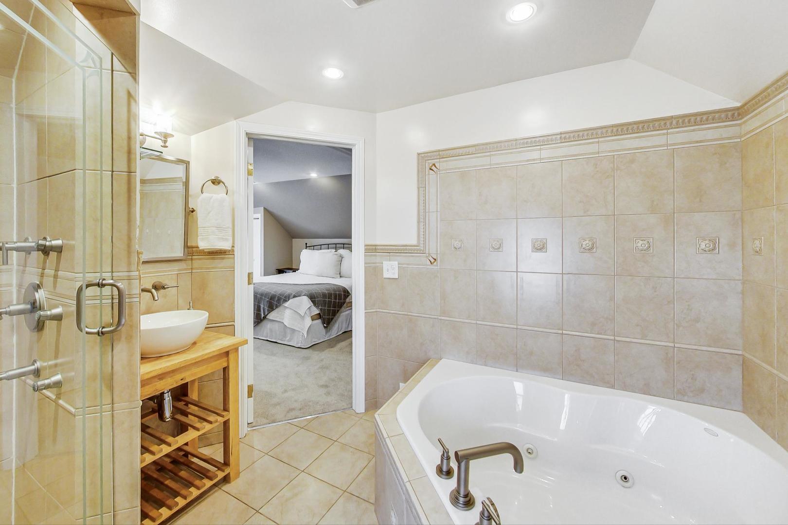 518 South Arlington Heights Road Arlington Heights, IL 60005 - Photo 22 of 42 a bathroom with a tub a sink and a shower