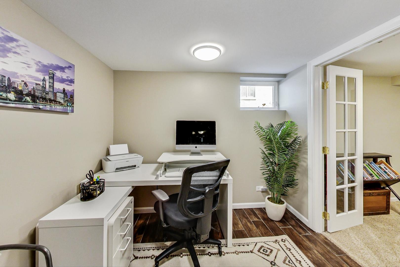 518 South Arlington Heights Road Arlington Heights, IL 60005 - Photo 32 of 42 a view of a workspace with furniture and wooden floor