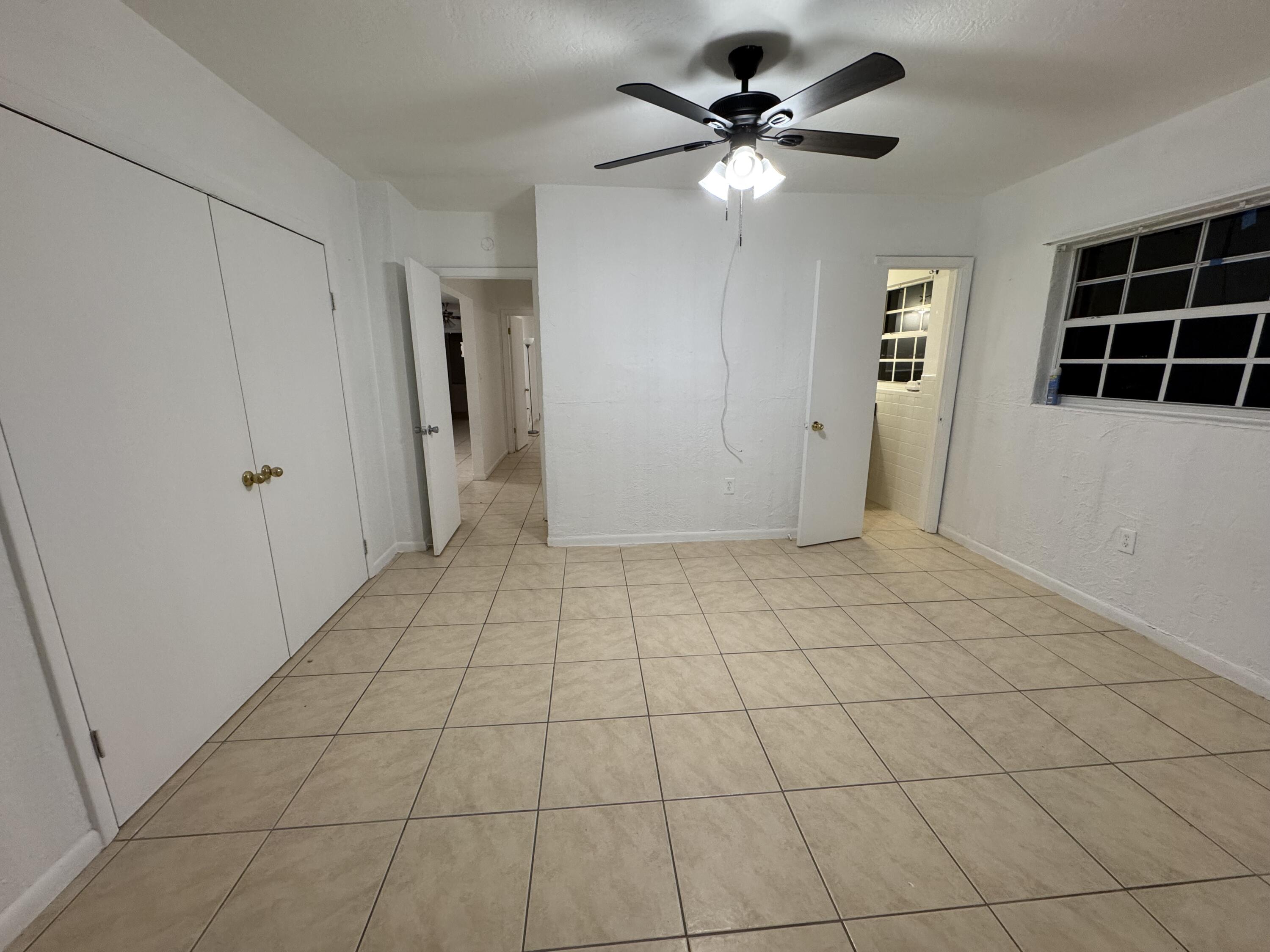 198 Southwest 15th Street Boca Raton, FL 33432 - Photo 11 of 11 a view of an empty room with a window