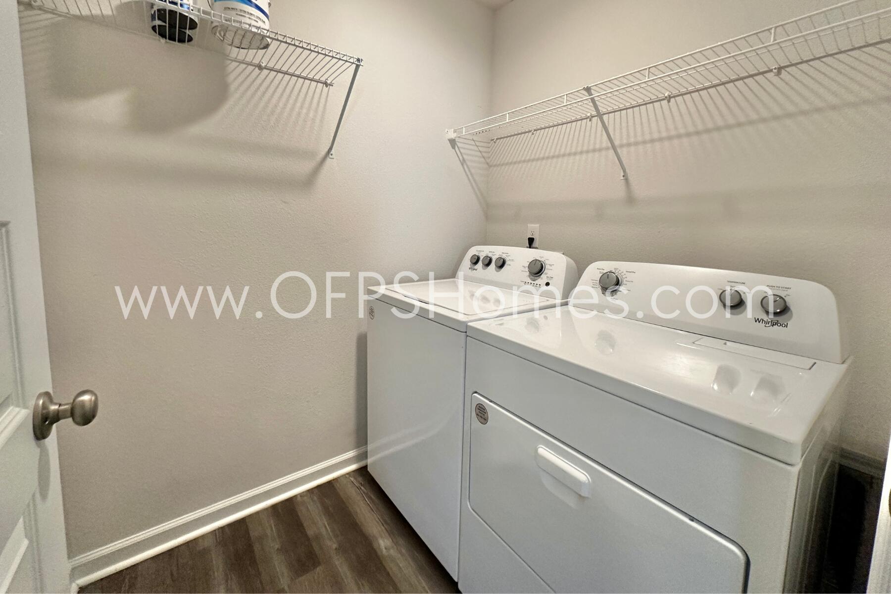 853 Otto Loop Crestview, FL 32539 - Photo 13 of 36 a utility room with dryer and washer
