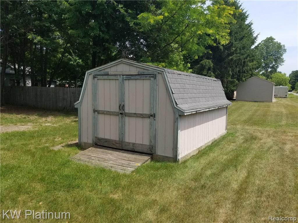 3266 Range Road Port Huron, MI 48060 - Photo 4 of 21 EXTRA LARGE SHED TO PUT MOWERS/BIKES/ETC