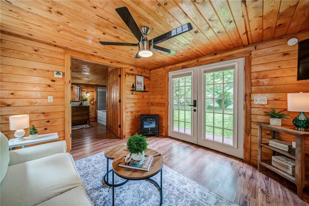 64 Bear Lake Drive Blue Ridge, GA 30513 - Photo 18 of 28 a living room with furniture and a fireplace