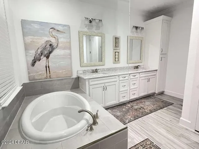 a white toilet sitting next to a white toilet