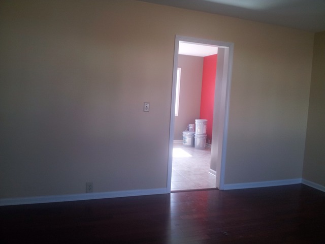 309 Tallman Avenue Romeoville, IL 60446 - Photo 6 of 16 a view of a room with wooden floor and a toilet