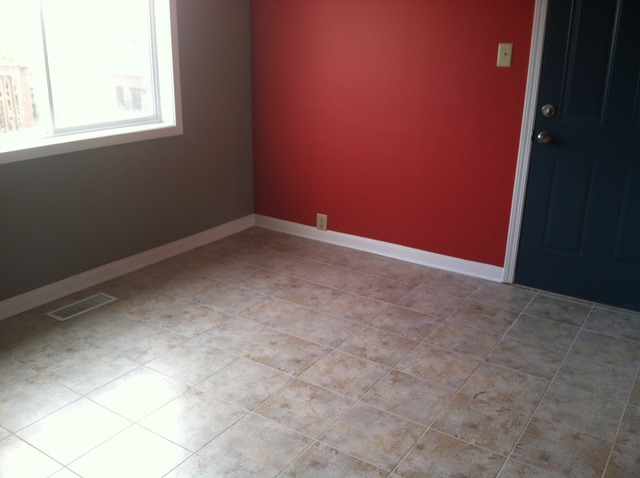 309 Tallman Avenue Romeoville, IL 60446 - Photo 8 of 16 an empty room with a window