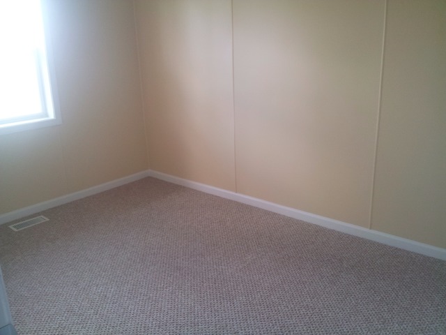309 Tallman Avenue Romeoville, IL 60446 - Photo 10 of 16 a room that has a window in it