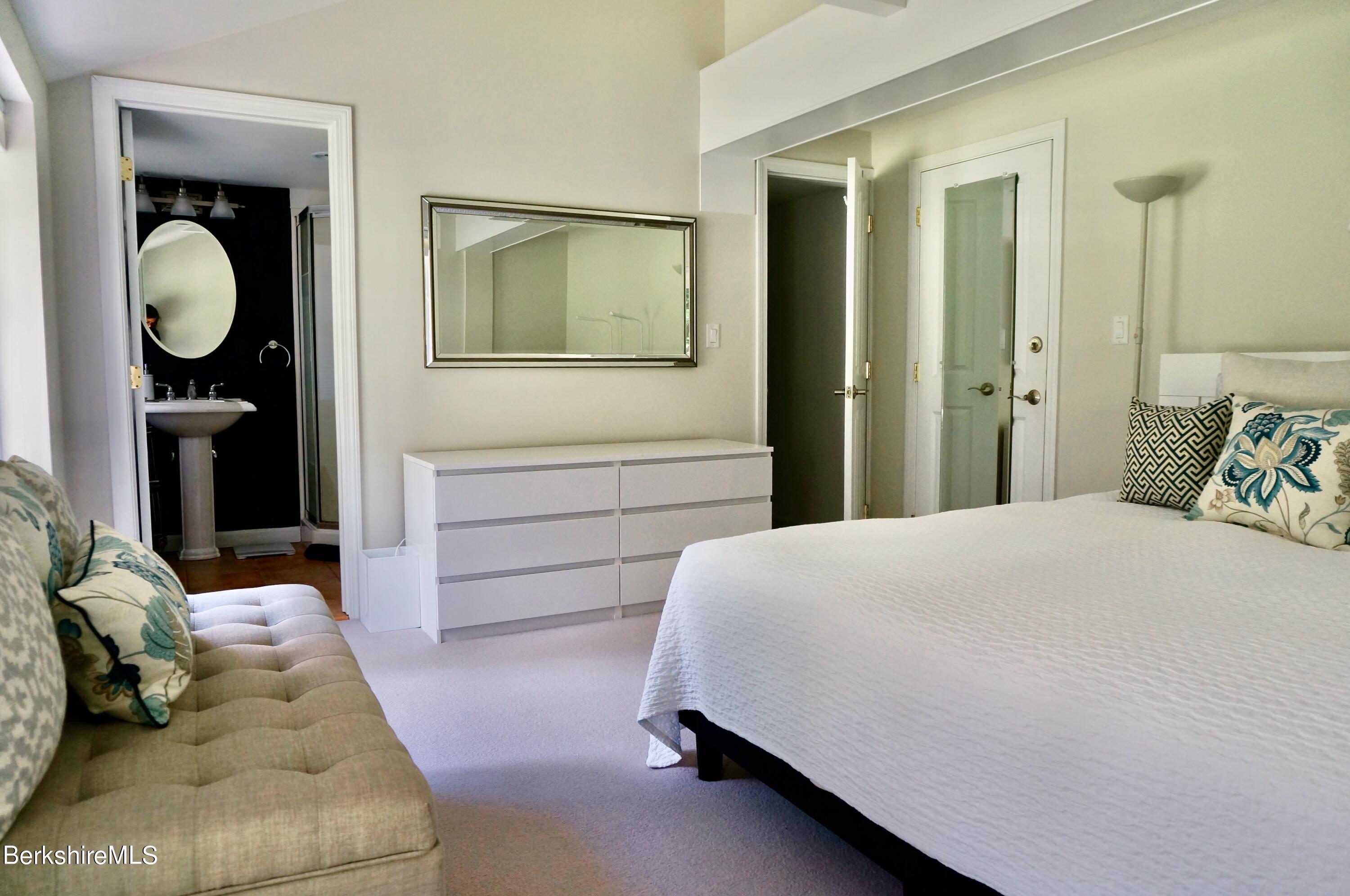 72 Interlaken Road, Unit 1 West Stockbridge, MA 01266 - Photo 14 of 16 a bedroom with a bed and closet