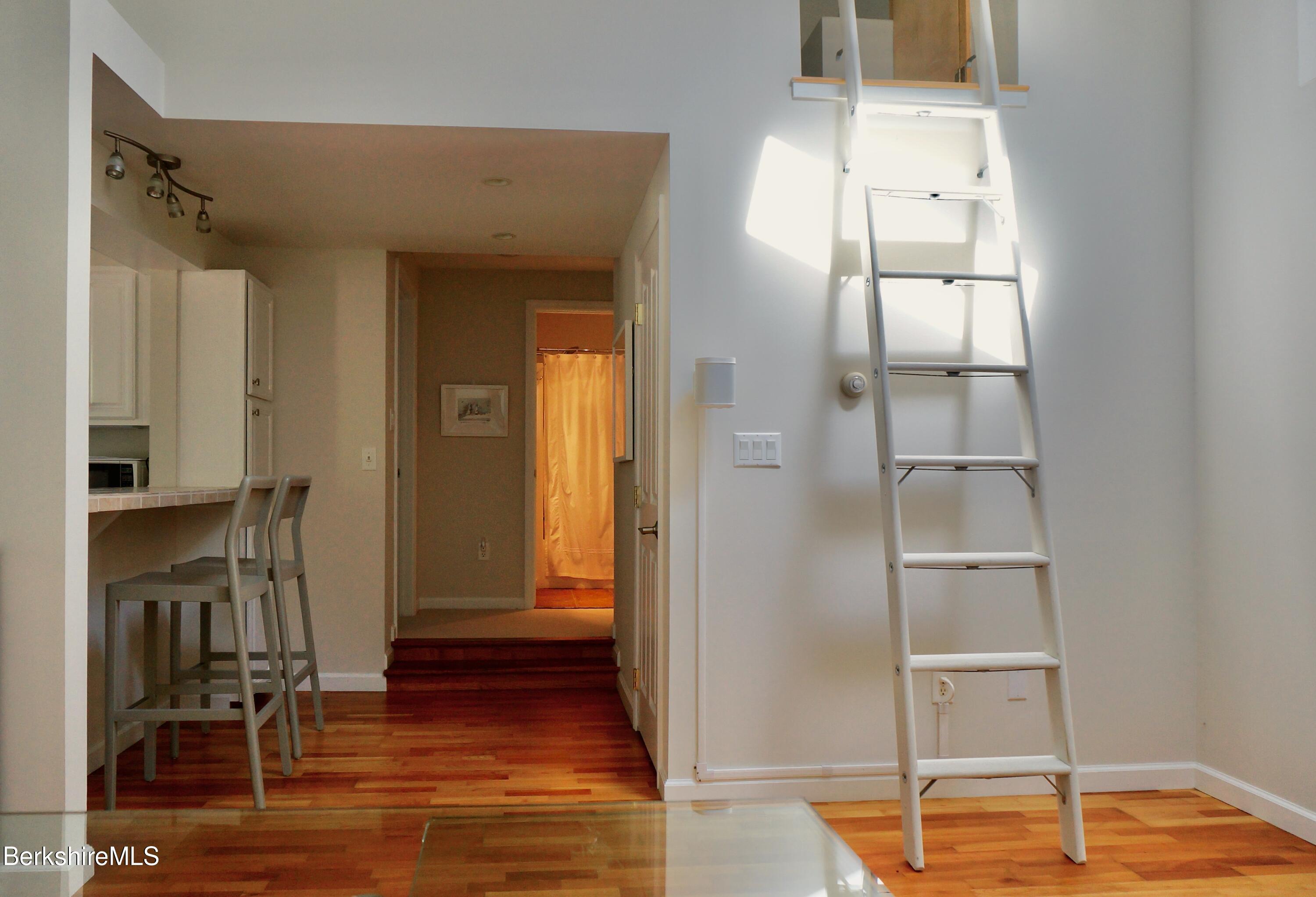 72 Interlaken Road, Unit 1 West Stockbridge, MA 01266 - Photo 9 of 16 a view of a room with gym equipment