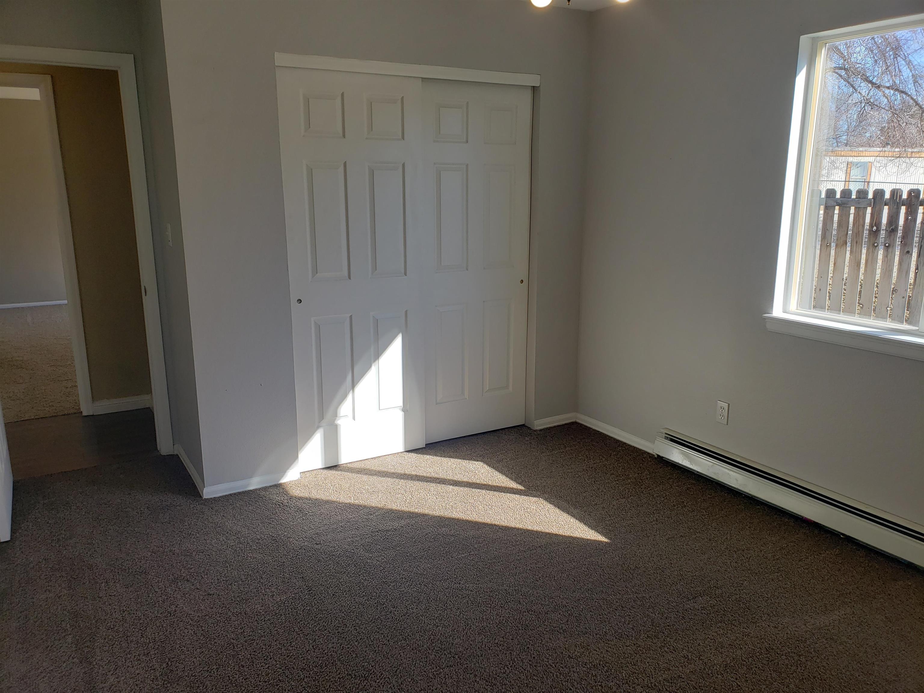 515 Quebec Court Fruita, CO 81521 - Photo 16 of 16 an empty room with windows