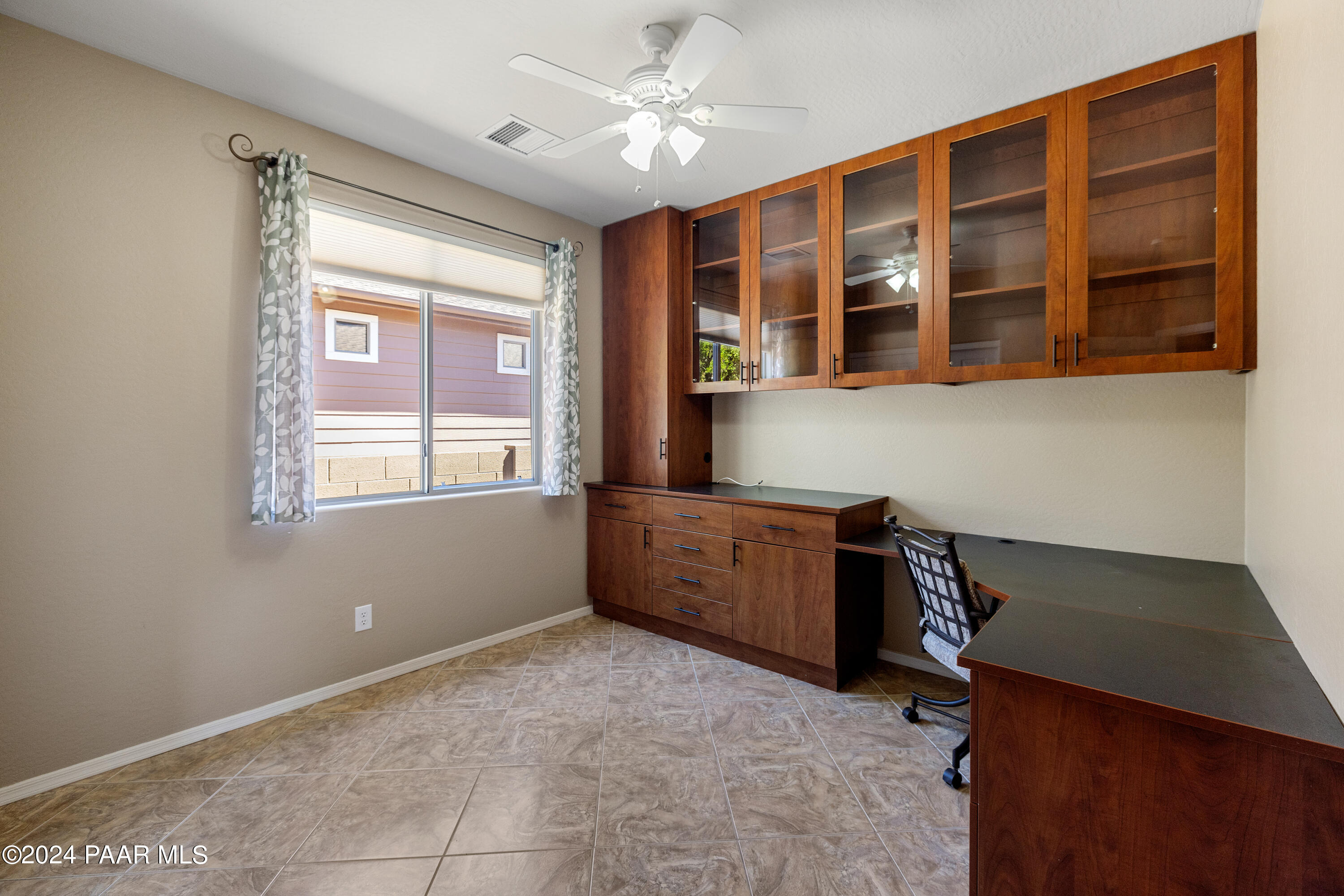 1195 Rigo Ranch Road Prescott Valley, AZ 86314 - Photo 13 of 65 a room with window and ceiling fan